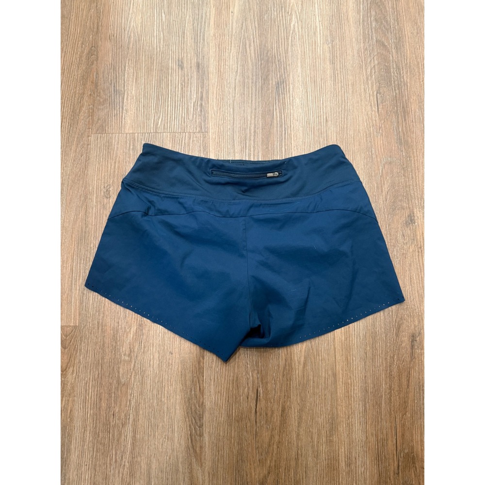 Athleta Womens Teal Blue Laser Cut Running Shorts Size S Back Zip Pocket 3153
